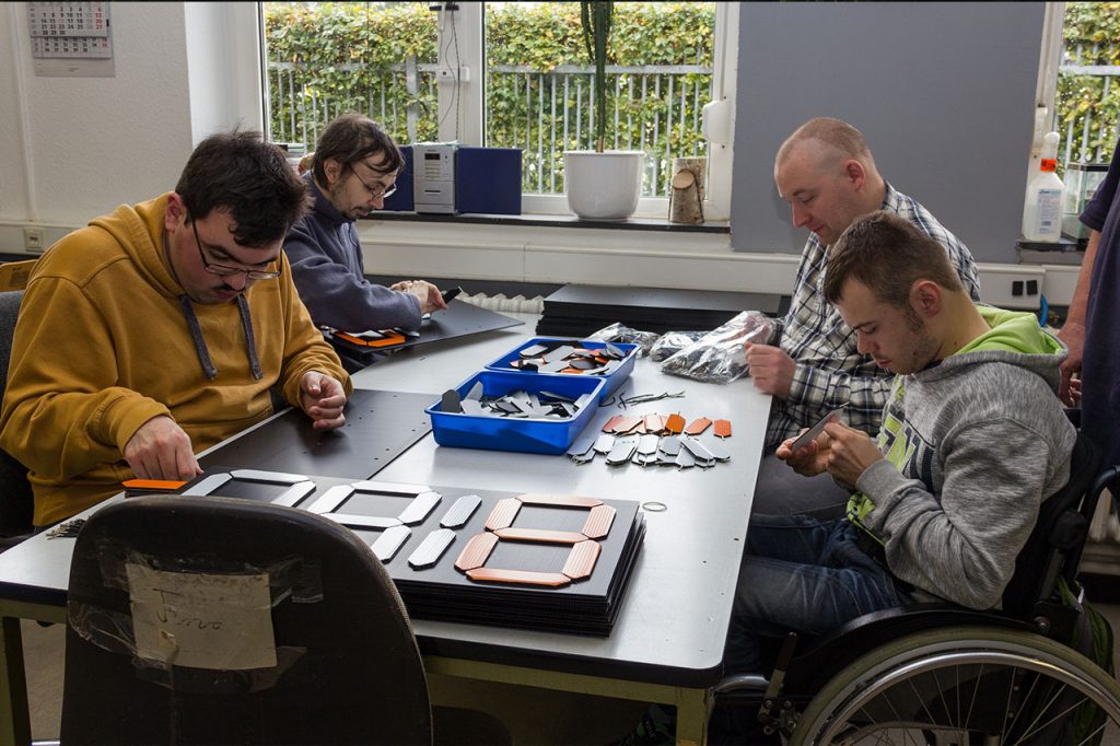 Team at Lebenshilfe Aachen assembling the scoreboards.